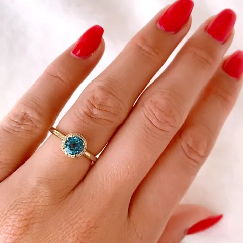 rund topas diamantring i 14 karat gull 1,08 ct 0,08 ct