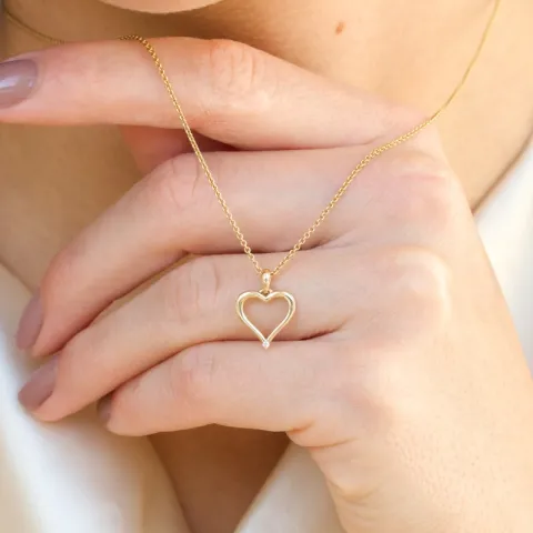 hjerte diamantanheng i 14 karat gull 0,01 ct