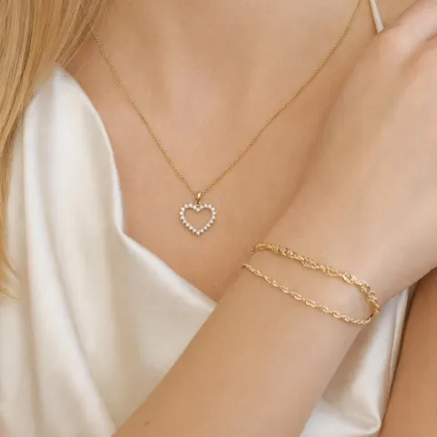 hjerte diamant anheng i 14 karat gull 0,33 ct