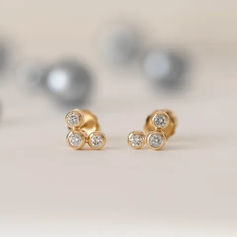 runde diamant ørestikker i 14 karat gull med diamant 