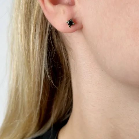2 x 0,25 ct svart diamant solitaireørepynt i 14 karat gull med svart diamant