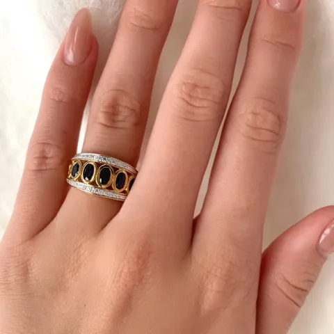 Stor abstrakt blå ring i 9 karat gull