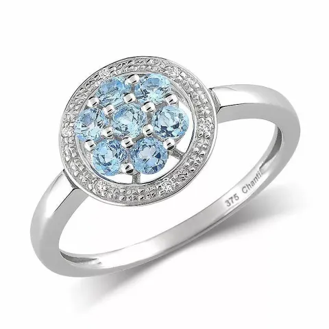 Rund blå topas ring i 9 karat hvitt gull