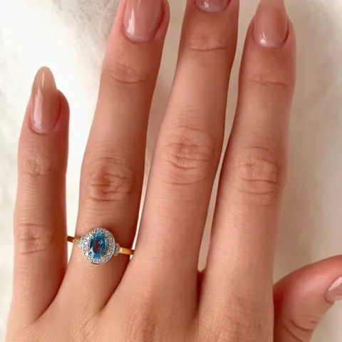 oval topas gull ring i 9 karat gull med rhodium