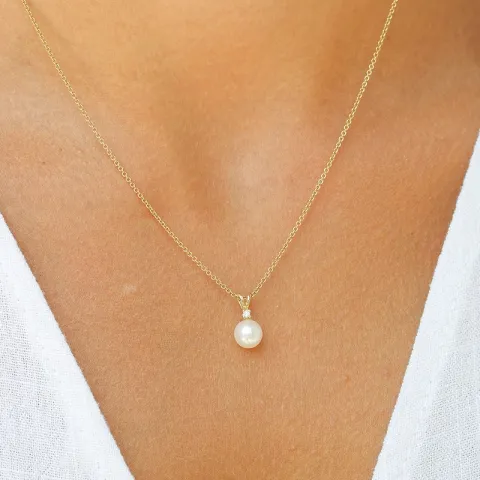 perle diamantanheng i 14 karat gull 0,02 ct