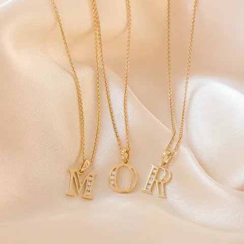 bokstav o anheng i 14 karat gull 0,03 ct