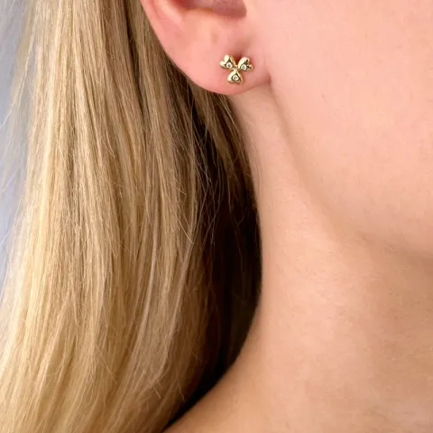blomst diamant ørestikker i 14 karat gull med diamant 