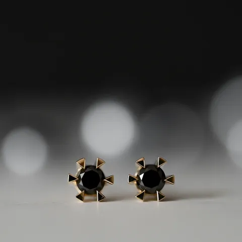 2 x 0,21 ct svart solitaireørepynt i 14 karat gull med svart diamant 