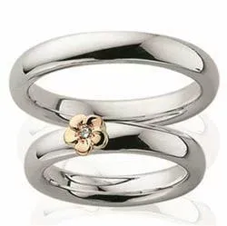 Scrouples gifteringer i sølv og alm. gull 0,02 ct