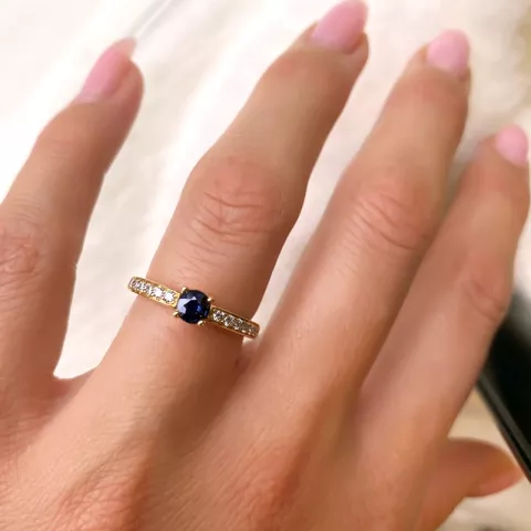 blå safir ring i 14 karat gull 0,20 ct 