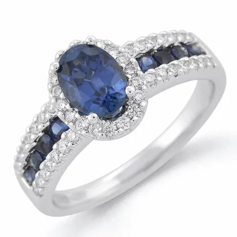 oval blå safir diamantring i 14 karat hvitt gull 0,286 ct 