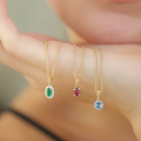 ovalt smaragd diamantanheng i 14 karat gull 0,25 ct 0,15 ct