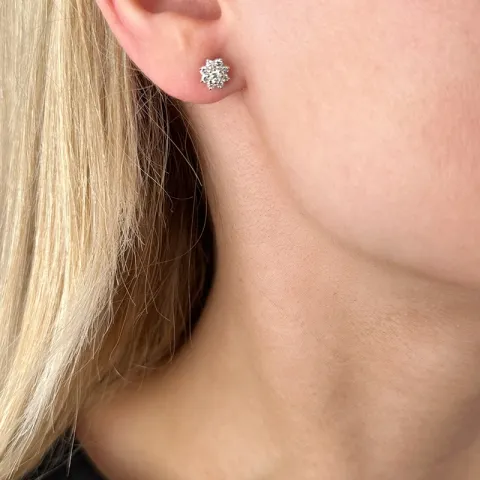blomst diamantøredobb i 14 karat gull med diamant