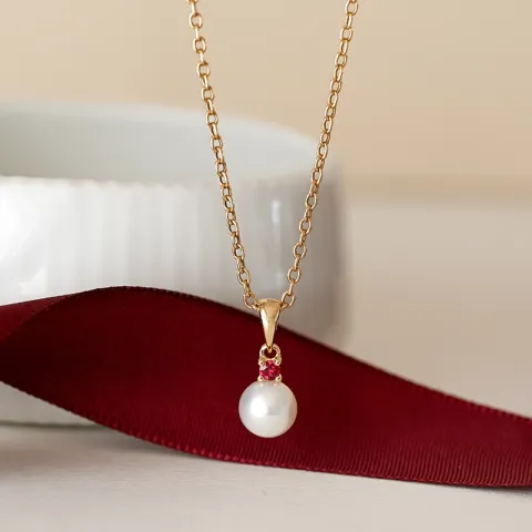 perle anheng i 9 karat gull 0,07 ct