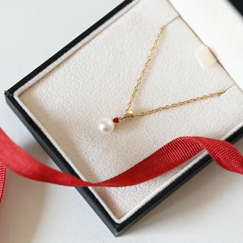 perle anheng i 9 karat gull 0,07 ct