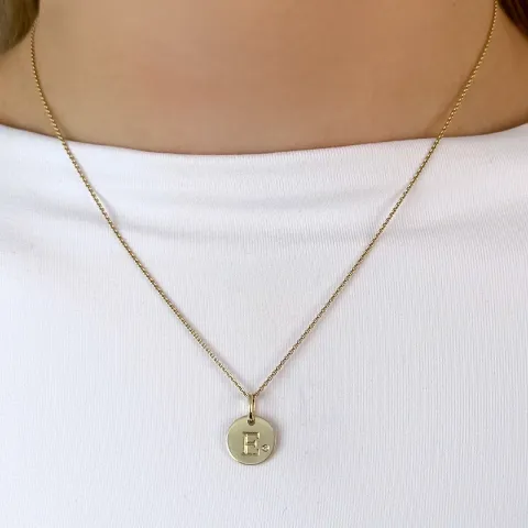 bokstav e diamant anheng i 9 karat gull 0,01 ct