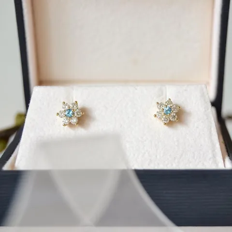 blomst topas diamantøredobb i 9 karat gull med diamant og topas