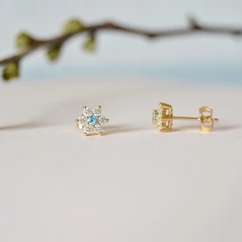 blomst topas diamantøredobb i 9 karat gull med diamant og topas