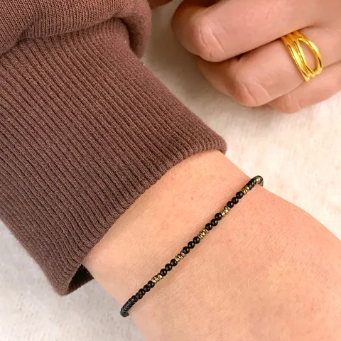 svart stein armbånd med onyks og hematite.