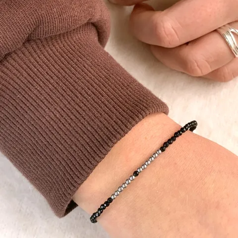 svart armbånd med onyks og hematite.