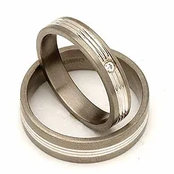 Gifteringer i 14 karat titanium og alm. gull 0,025 ct