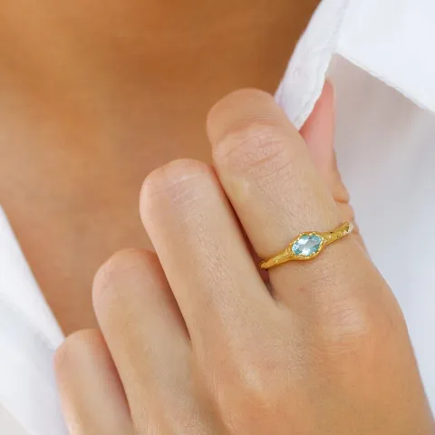 blå krystall ring i forgylt sølv