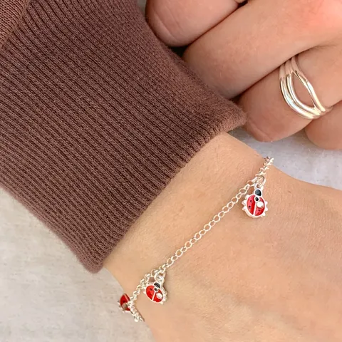 marihøne armbånd i sølv med anheng i sølv