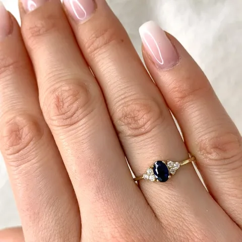 blå safir diamantring i 14 karat gull 0,57 ct 0,13 ct