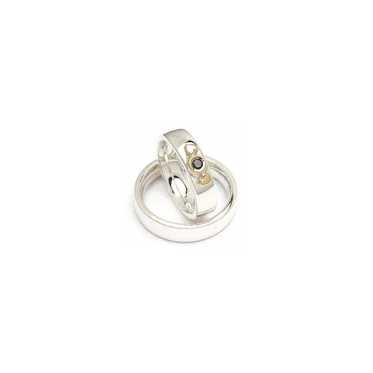 Gifteringer fra rs of scandinavia i sølv og alm. gull 0,05 ct