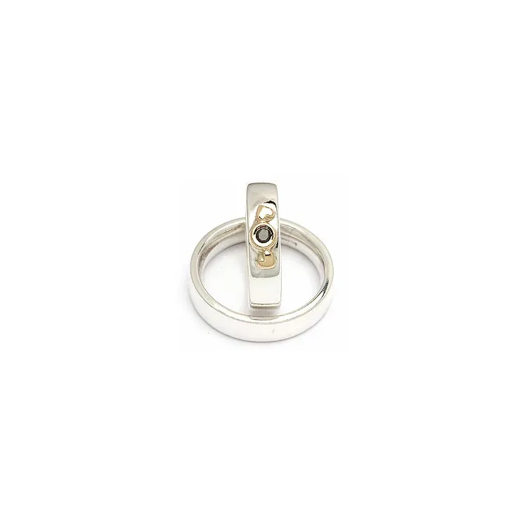 Gifteringer fra rs of scandinavia i sølv og alm. gull 0,05 ct