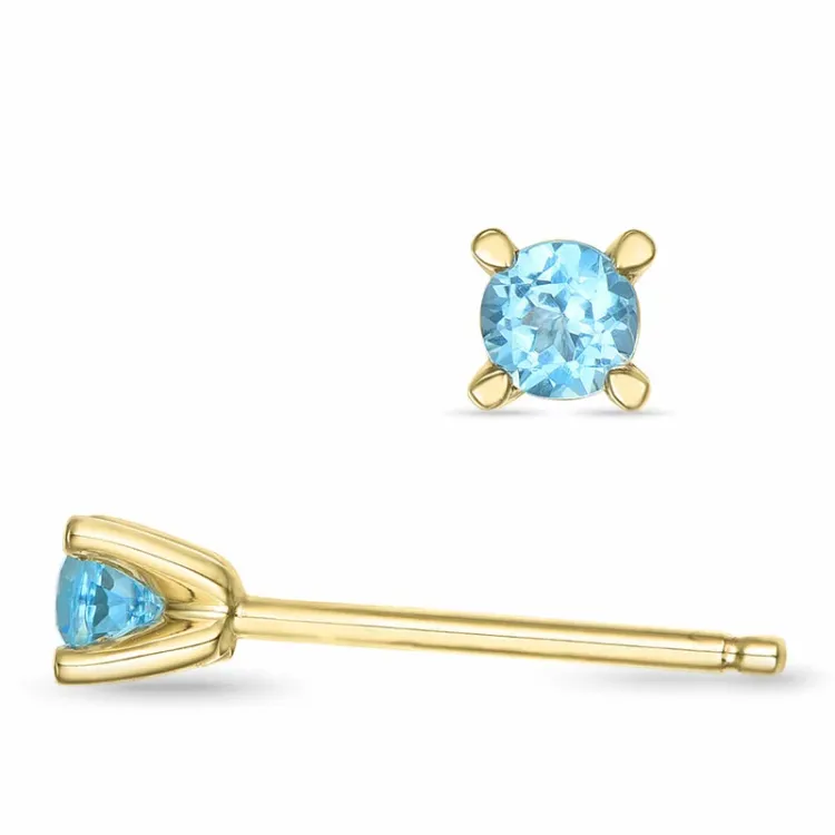 2 x 0,14 ct topas solitaireørepynt i 14 karat gull med topas