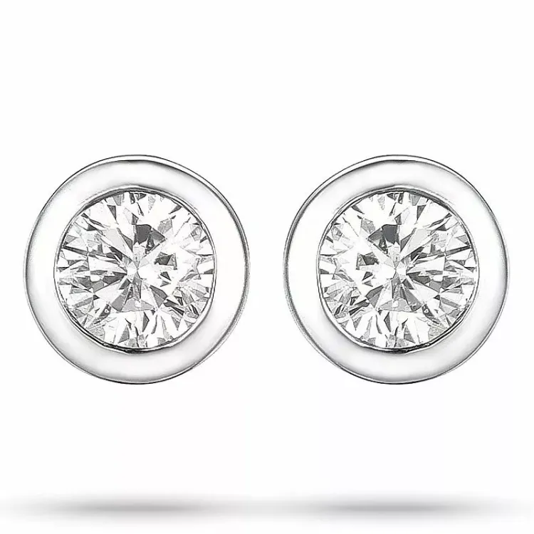 2 x 0,05 ct diamant solitaireørepynt i 14 karat hvitt gull med diamant 