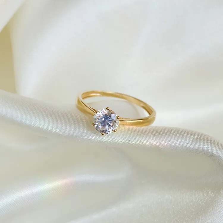 gullringer: solitairering i 9 karat gull - Gold Collection