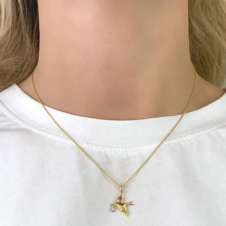 fugl anheng i 9 karat gull med rhodium