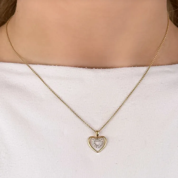 hjerte diamant anheng i 14 karat gull og hvitt gull 0,08 ct