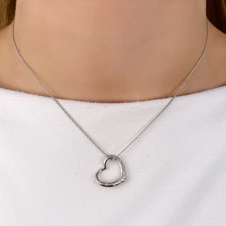 hjerte anheng i 14 karat hvitt gull 0,12 ct
