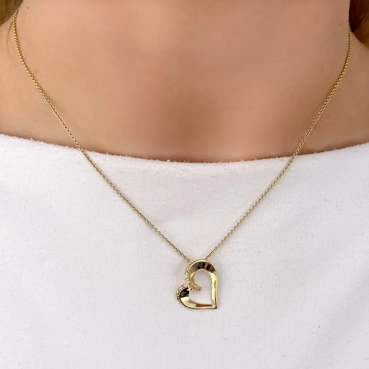 hjerte diamantanheng i 14 karat gull 0,06 ct