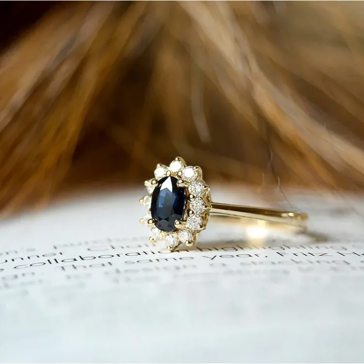 safir rosettring i 14 karat gull 0,26 ct 0,65 ct