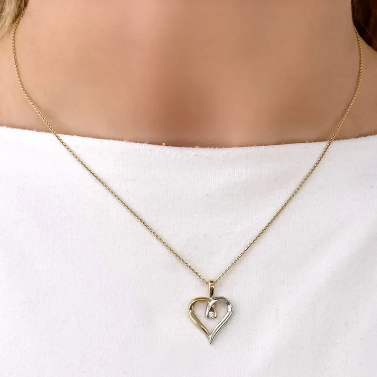 hjerte diamant anheng i 14 karat gull og hvitt gull 0,04 ct
