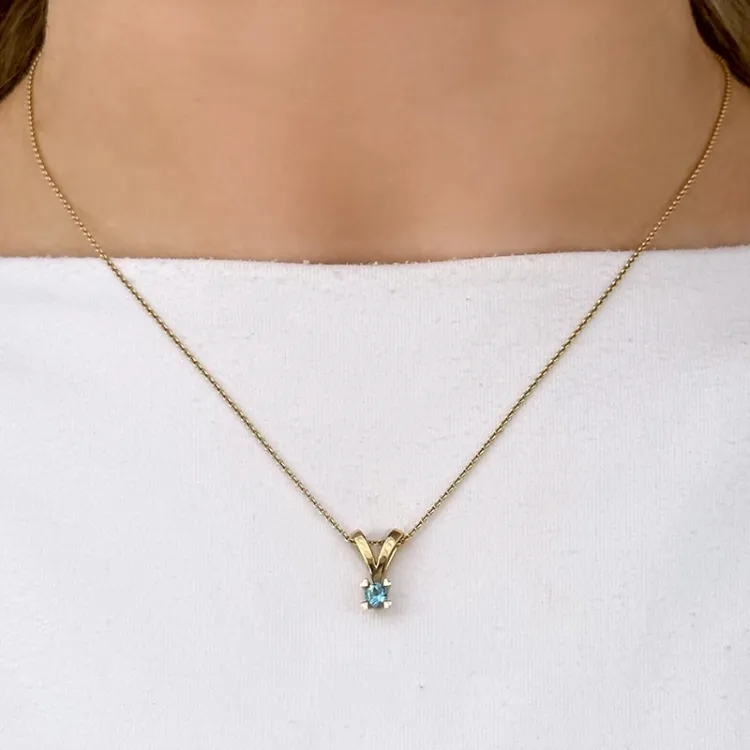 topas gullanheng i 14 karat gull 0,22 ct