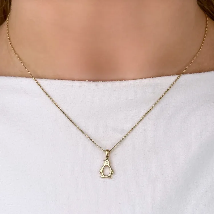 pingvin diamant gullanheng i 14 karat gull 0,01 ct