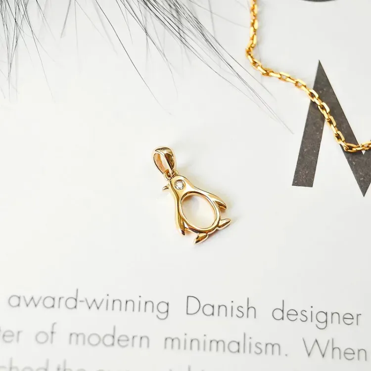 pingvin diamant gullanheng i 14 karat gull 0,01 ct