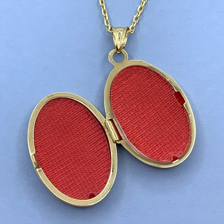 16 x 33 mm medaljong anheng i 14 karat gull