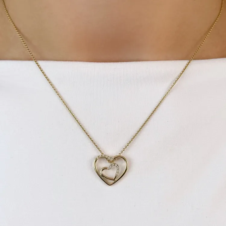 hjerte diamantanheng i 14 karat gull 0,05 ct