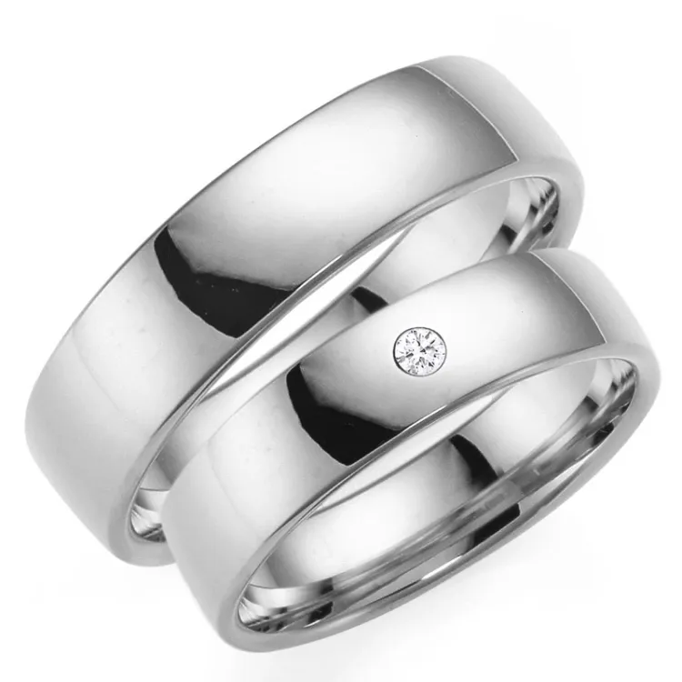 6 og 5 mm gifteringer i 14 karat hvitt gull 0,03 ct - par