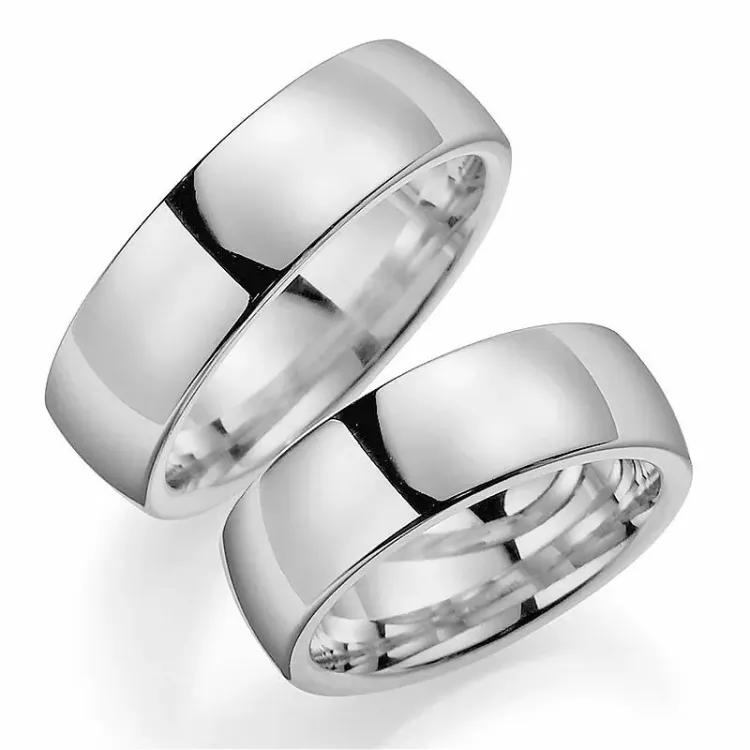 Bredde 7 mm gifteringer i 14 karat hvitt gull - par