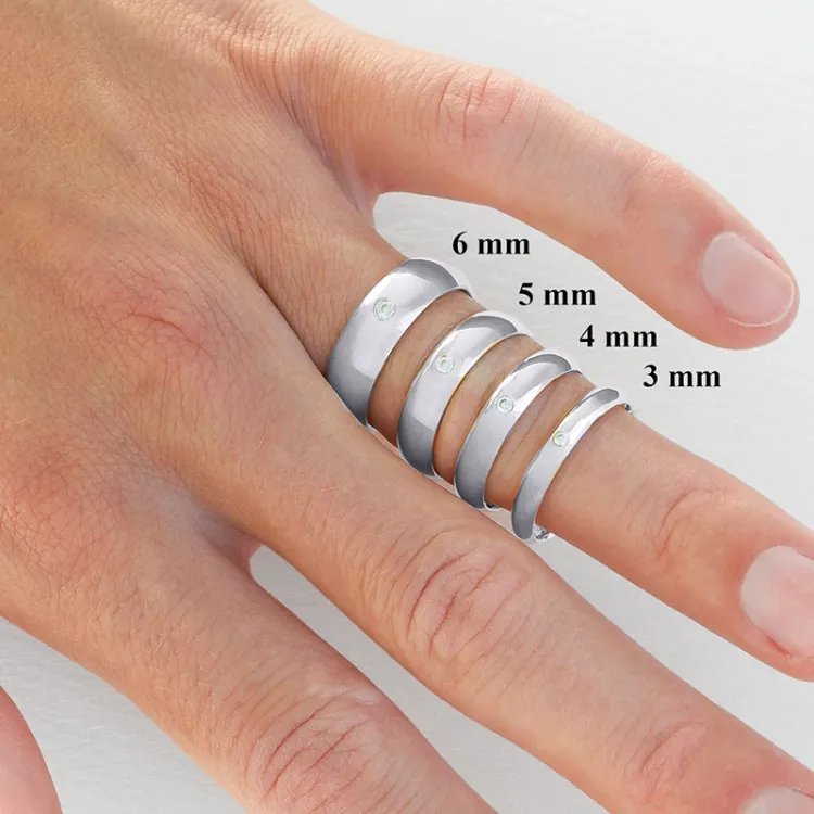 4 mm giftering i 14 karat hvitt gull 0,03 ct