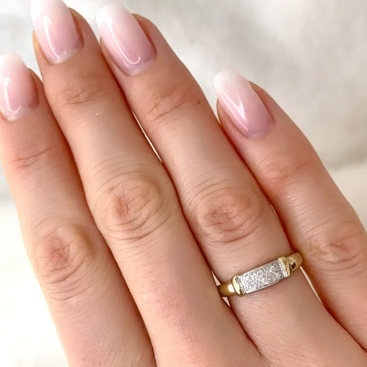 abstrakt diamant ring i 9 karat gull og hvitt gull 0,05 ct