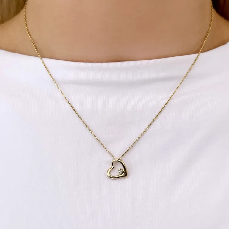 hjerte anheng i 9 karat gull 0,03 ct