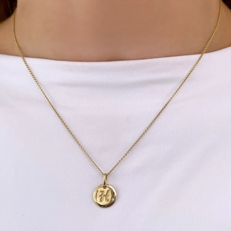 bokstav h diamant anheng i 9 karat gull 0,01 ct